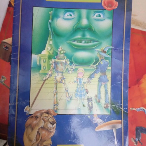 Folder with 4 large fairy tale books like new, 90s