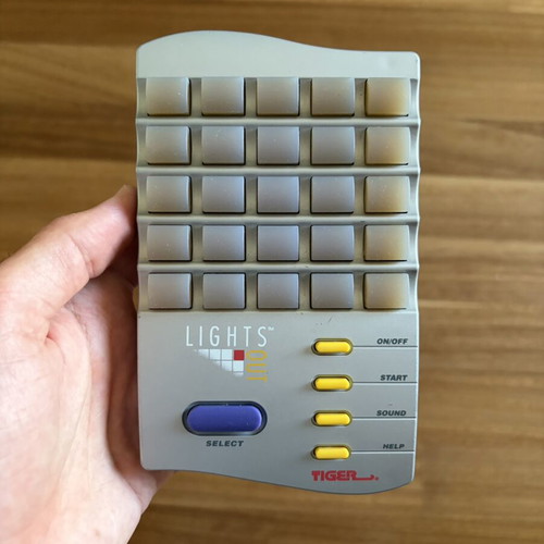 Tiger Lights Out game 1995 used, puzzle