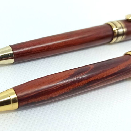 Wooden pen set used with gold details and wooden case