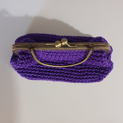 Knitted clutch bag like new, purple with gold details