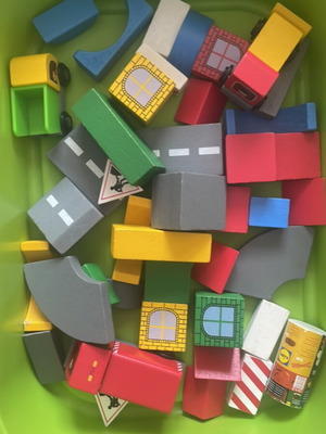 Wooden building blocks used with road and trucks