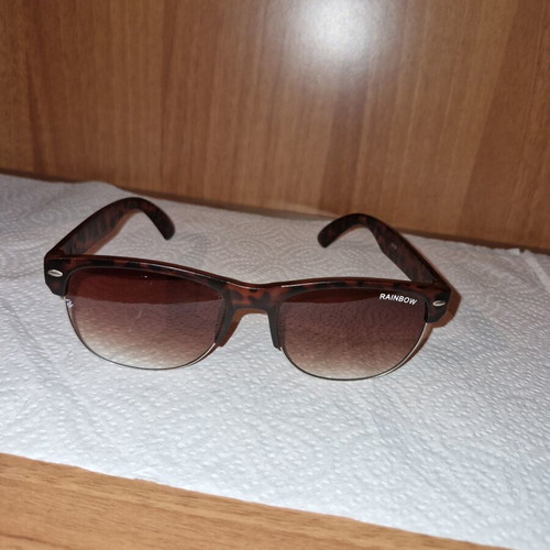 Sunglasses used, brown