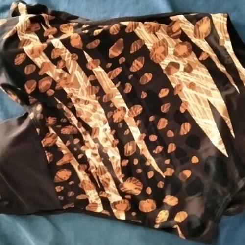 One-piece swimsuit printed black with beige and brick in excellent condition