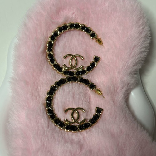 Gold and black hoop earrings