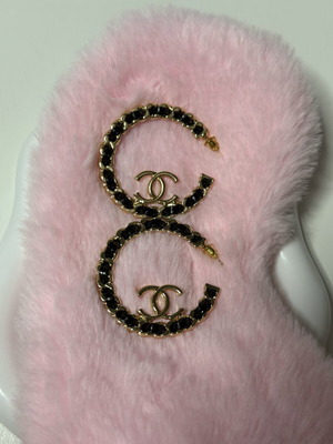 Gold and black hoop earrings