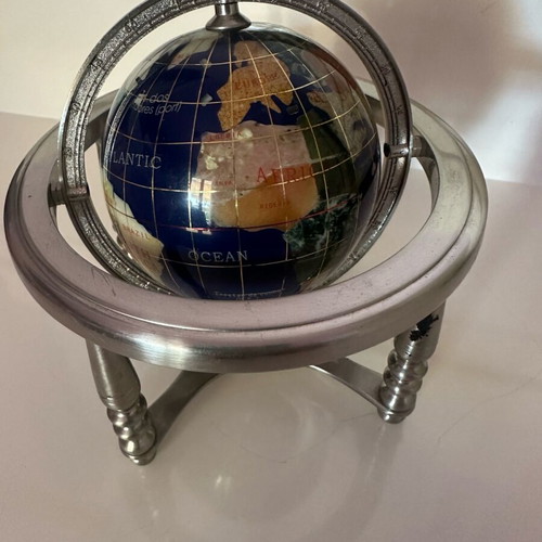 Decorative globe made of semi-precious stones like new