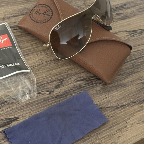 Ray Ban sunglasses with gold frame like new