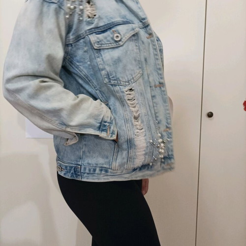 Denim jacket like new with rips, pearls and rhinestones