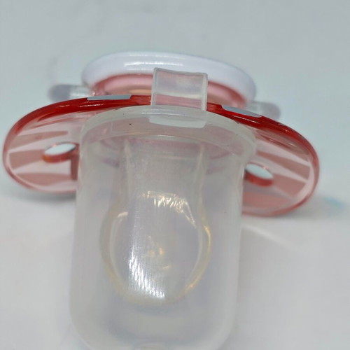 Silicone pacifier with cap and cat design like new, pink