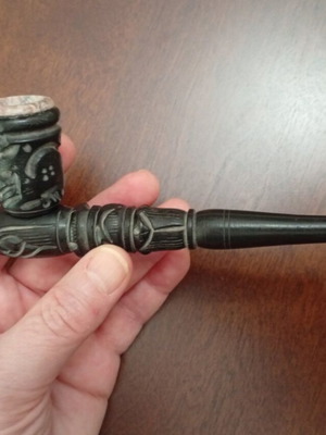 Handmade carved wooden pipe with stone inlay