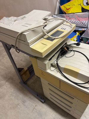 Photocopier used with worn plastic rollers