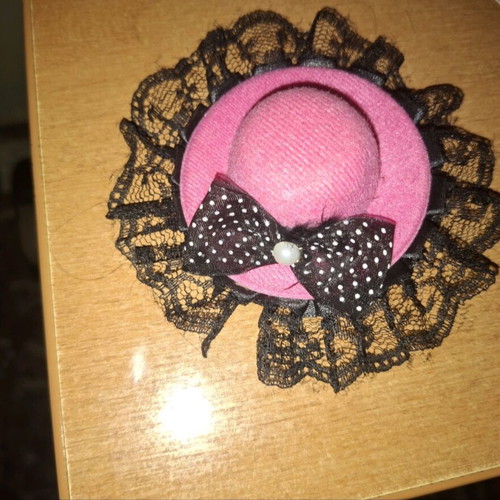 Mini decorative hat used with lace and polka dot bow