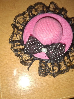 Mini decorative hat used with lace and polka dot bow