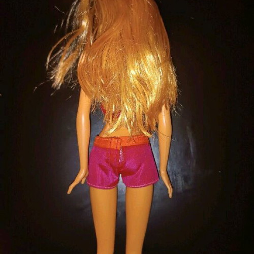 Barbie doll used with minor imperfections, authentic outfit