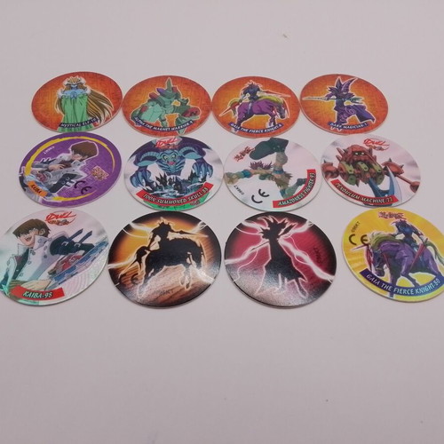 Vintage Yu-Gi-Oh! Tazos set like new, 12 collectible duel tokens