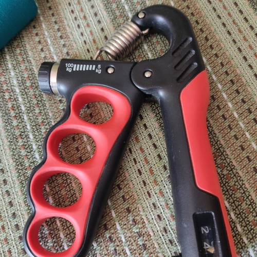 Fitness tools set of 2 used, hand grip and stretching band