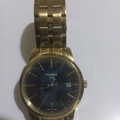 Tissot 1853 men's quartz watch like new, gold
