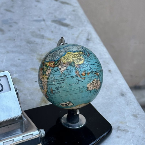 Vintage desk set with globe and mechanical calendar
