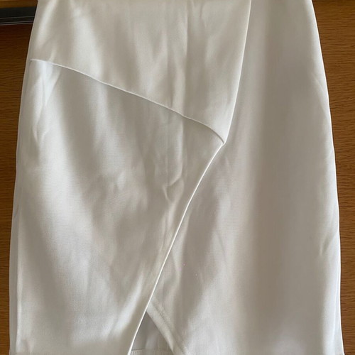 White skirt with unique front design like new
