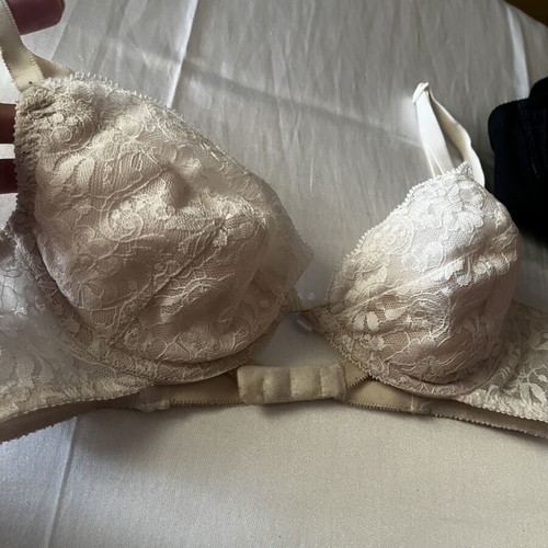 Bras extra small used, black satin and white lace set of two
