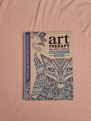 Art therapy coloring book hard cover slightly used
