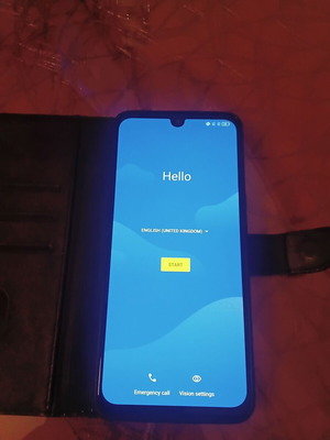 TCL 30 smartphone like new, 6.72 inch, with book-style case and box