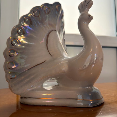 Vintage ceramic peacock decoration used with iridescent finish