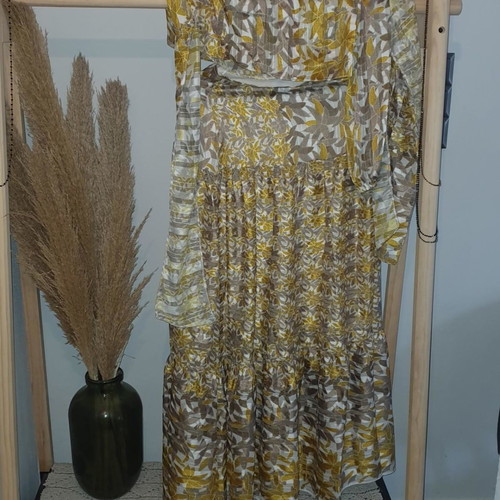 Anna Samouka set used with one-shoulder top and high-waist maxi skirt