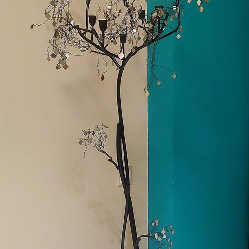 Metal floor candle holder with flexible branches, gothic style