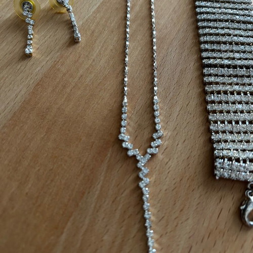 Jewelry set with rhinestones used, necklace, earrings & bracelet