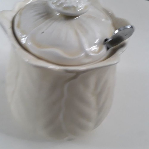 White porcelain sugar bowl used without spoon