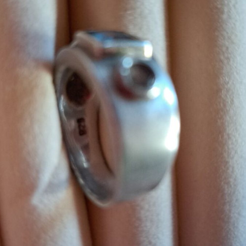 Silver ring with blue stones like new