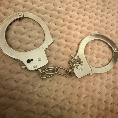 Steel handcuffs with locks like new