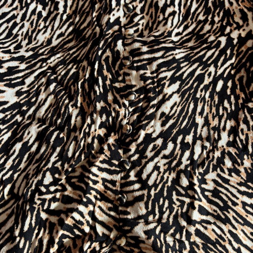 Leopard skirt like new with front button details, size XS
