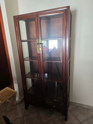 Showcase made of solid wood used with glass doors and drawers