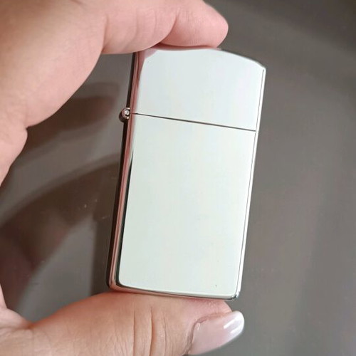 Zippo lighter like new, silver shiny, 90s decade
