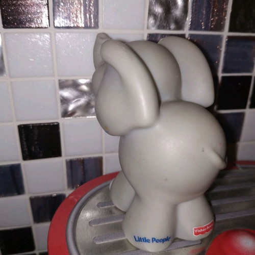 Little People Fisher Price used, 2001, with scratches on ear