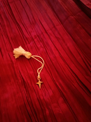 Christmas star charm with golden tassel like new
