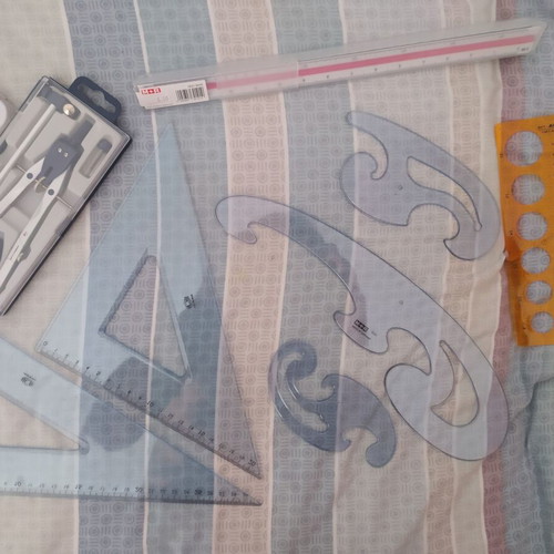 Drafting tools set new with rulers, compasses, and templates