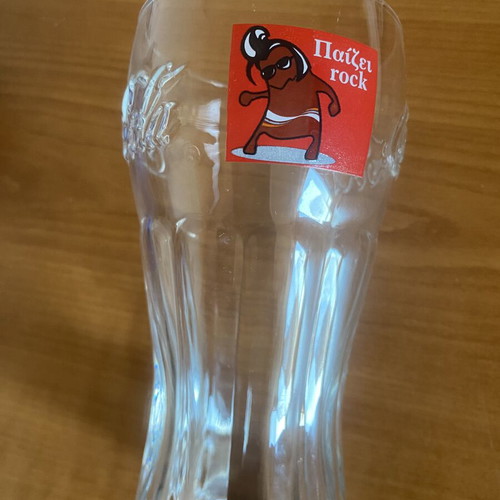 Coca-Cola collectible glass with "Παίζει Rock" logo, vintage