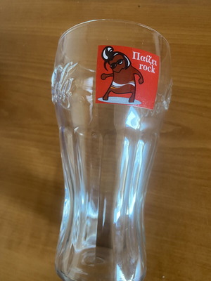 Coca-Cola collectible glass with "Παίζει Rock" logo, vintage
