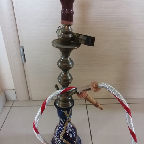 Oriental hookah used with stained glass bottle