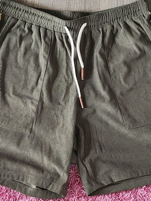 Shorts new without tags, 100% polyester with corduroy texture