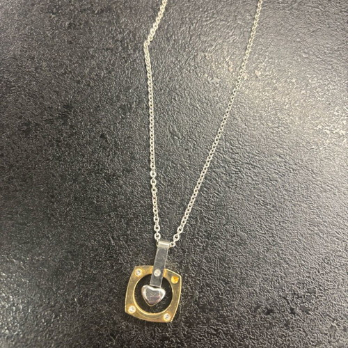 Necklace used with one missing rhinestone in excellent condition