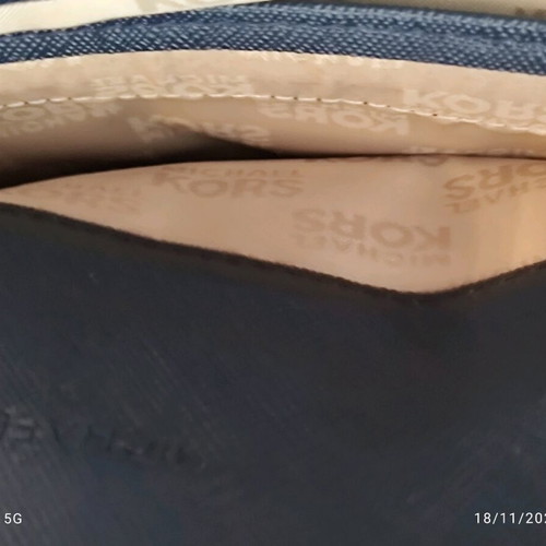 Michael Kors blue leather clutch bag like new with silver clasp