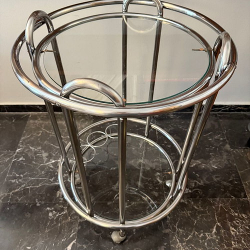 Vintage round trolley bar used with chrome tubular steel and glass shelves