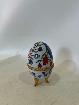 Vintage porcelain egg used with colorful flower designs 10x5.5