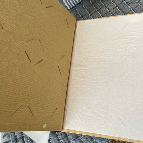 Photo album used with recycled paper, wood and natural leaf
