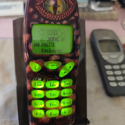 Nokia 3210 vintage cell phone used with new battery and front cover