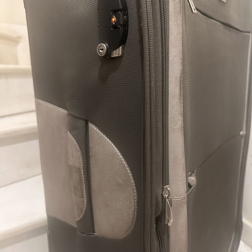 Delsey large travel suitcase like new, fabric with velour details